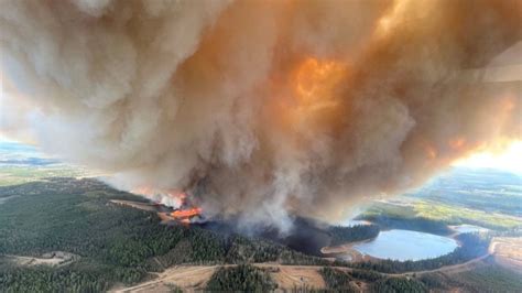 Several thousand people forced from homes as wildfires burn across Alberta